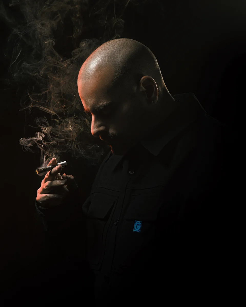 Berner in a dark portrait